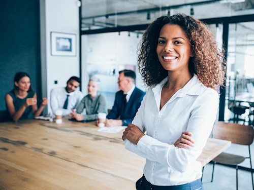 Female advisor in conference room.